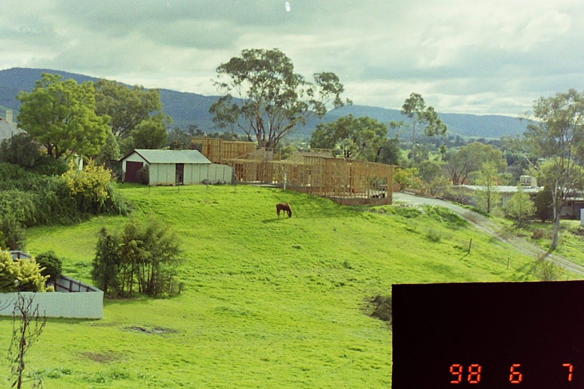 Distant view of wall and roof frames