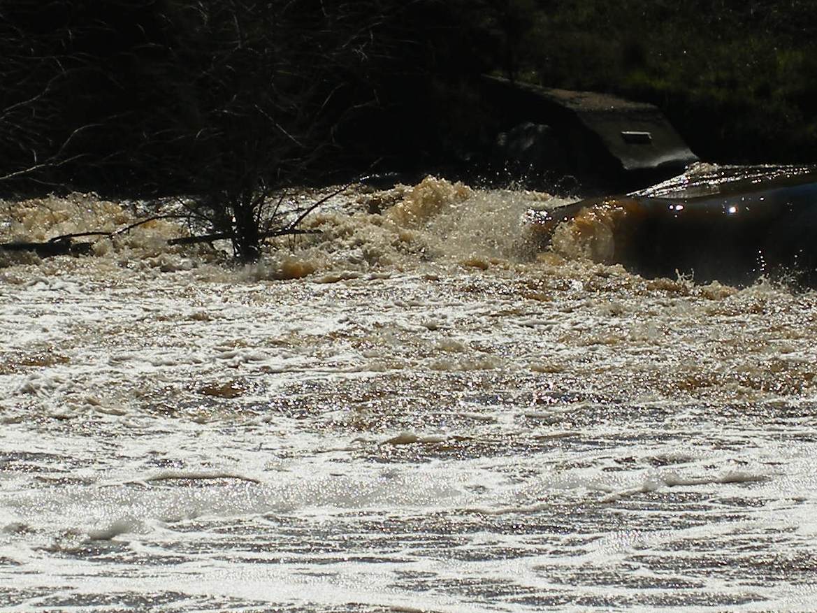 Water flowing over a weir